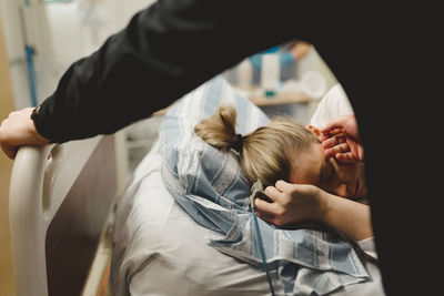 Woman with partner in delivery room