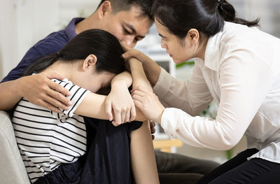 Business colleagues stacking hands