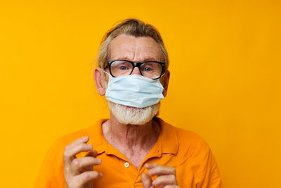 Portrait of senior man wearing mask