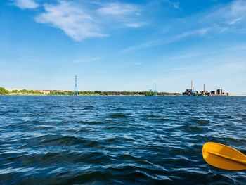 Scenic view of sea against blue sky