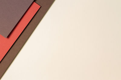 High angle view of paper on table against white background