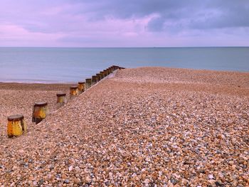 Scenic view of beach against sky