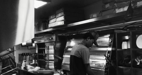 Man standing in restaurant