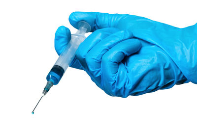 Low angle view of human hand on white background