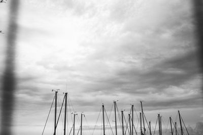 Low angle view of sailboat in sea against sky