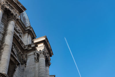 Low angle view of building against blue sky