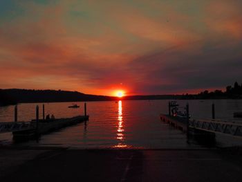 Silhouette of pier at sunset