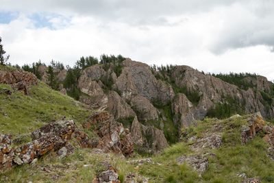 Panoramic view of rocky mountains against sky