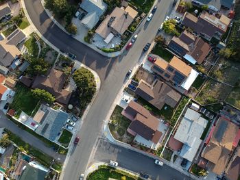 High angle view of street amidst buildings in town