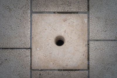 High angle view of hole on wall