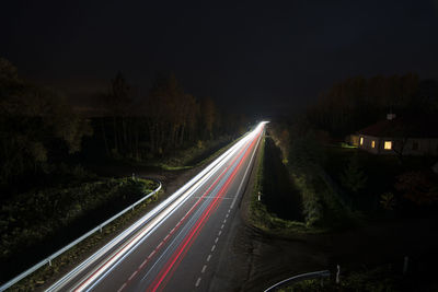 Light trails on road at night