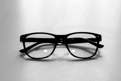 Close-up of eyeglasses on table