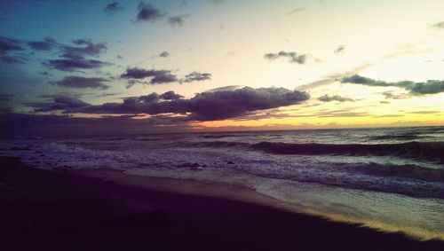 Scenic view of sea at sunset