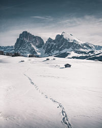 Scenic view of snowcapped mountains against sky