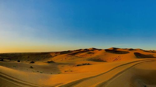 Scenic view of desert against sky