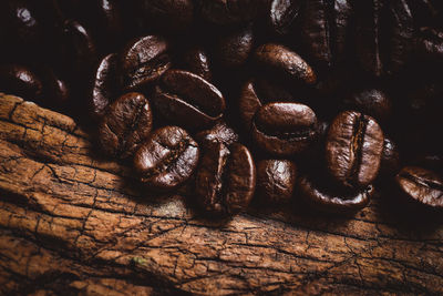 Close-up of coffee beans on table