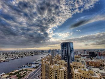 High angle view of buildings against sky during sunset