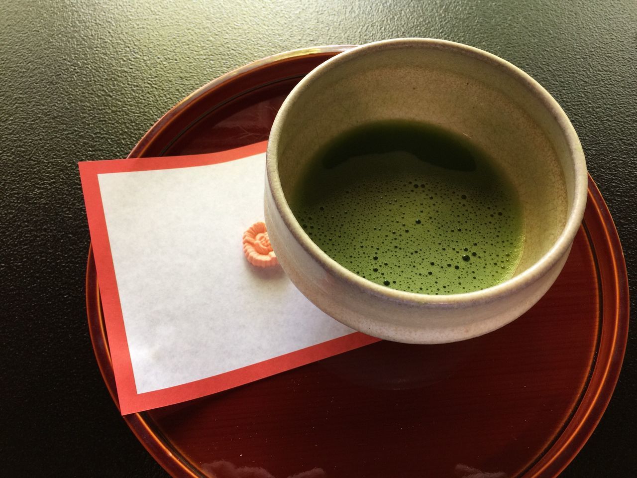 drink, food and drink, indoors, coffee cup, refreshment, table, freshness, coffee - drink, saucer, cup, still life, coffee, high angle view, spoon, directly above, tea cup, close-up, healthy eating, tea, beverage