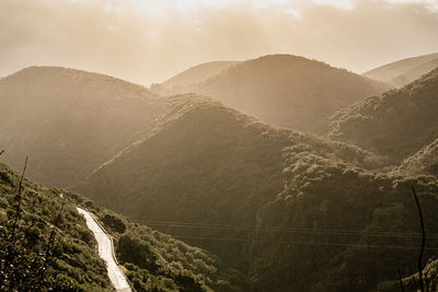 Panoramic view of mountain range against sky