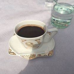 Close-up of coffee cup on table