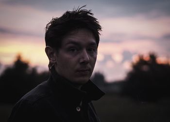 Portrait of man against sky during sunset