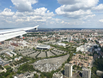 High angle view of buildings in city against sky