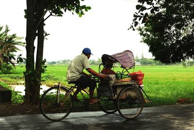 Rear view of bicycle on field