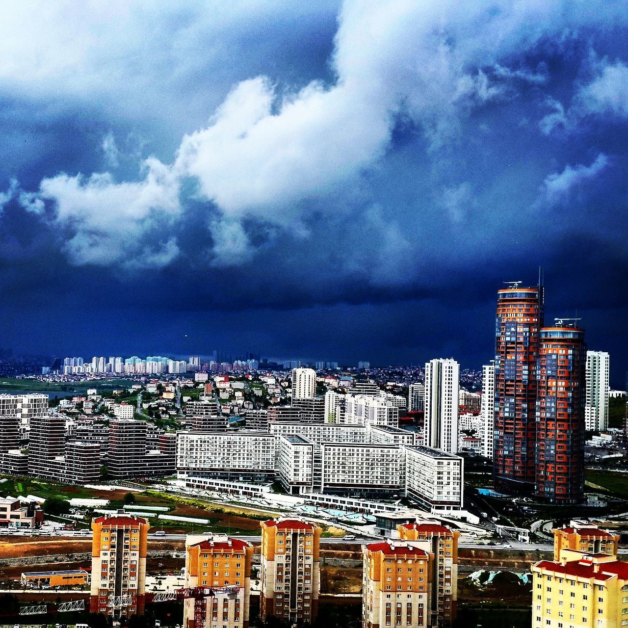 sky, city, cityscape, building exterior, architecture, cloud - sky, built structure, urban skyline, outdoors, skyscraper, no people, day