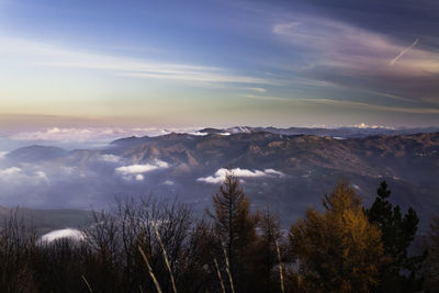 Scenic view of landscape against sky during sunset