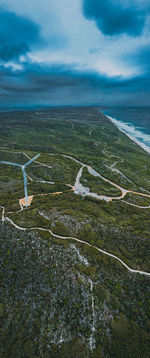 High angle view of sea shore against sky