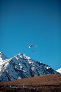 Paragliding in winter in the mountains