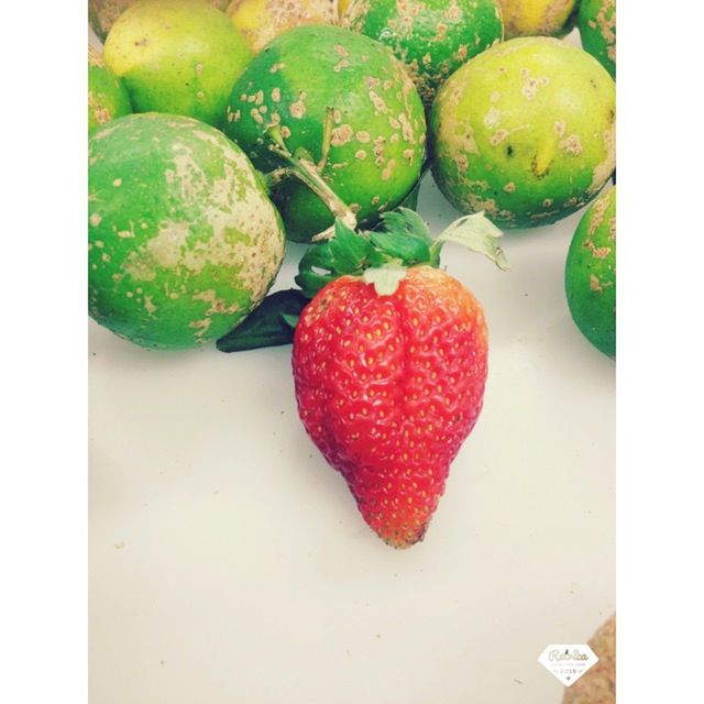 transfer print, food and drink, auto post production filter, food, healthy eating, red, fruit, still life, freshness, high angle view, indoors, close-up, table, directly above, strawberry, no people, vegetable, ripe, green color, variation