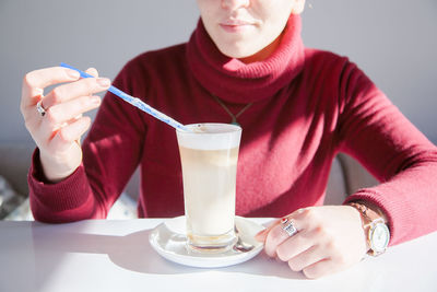 Close-up of a man with drink