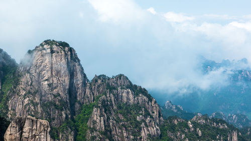 Panoramic view of rocky mountains against sky