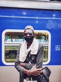 Full length of man standing by train