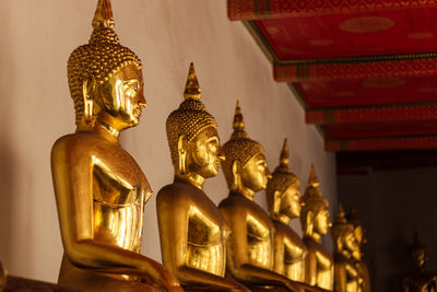 Statue in temple against building