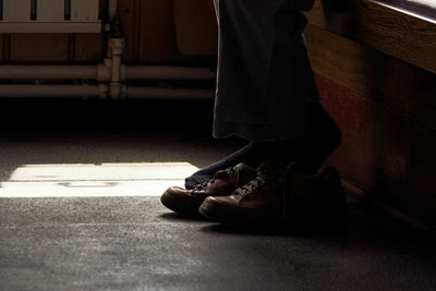 Low section of man traveling in ferry