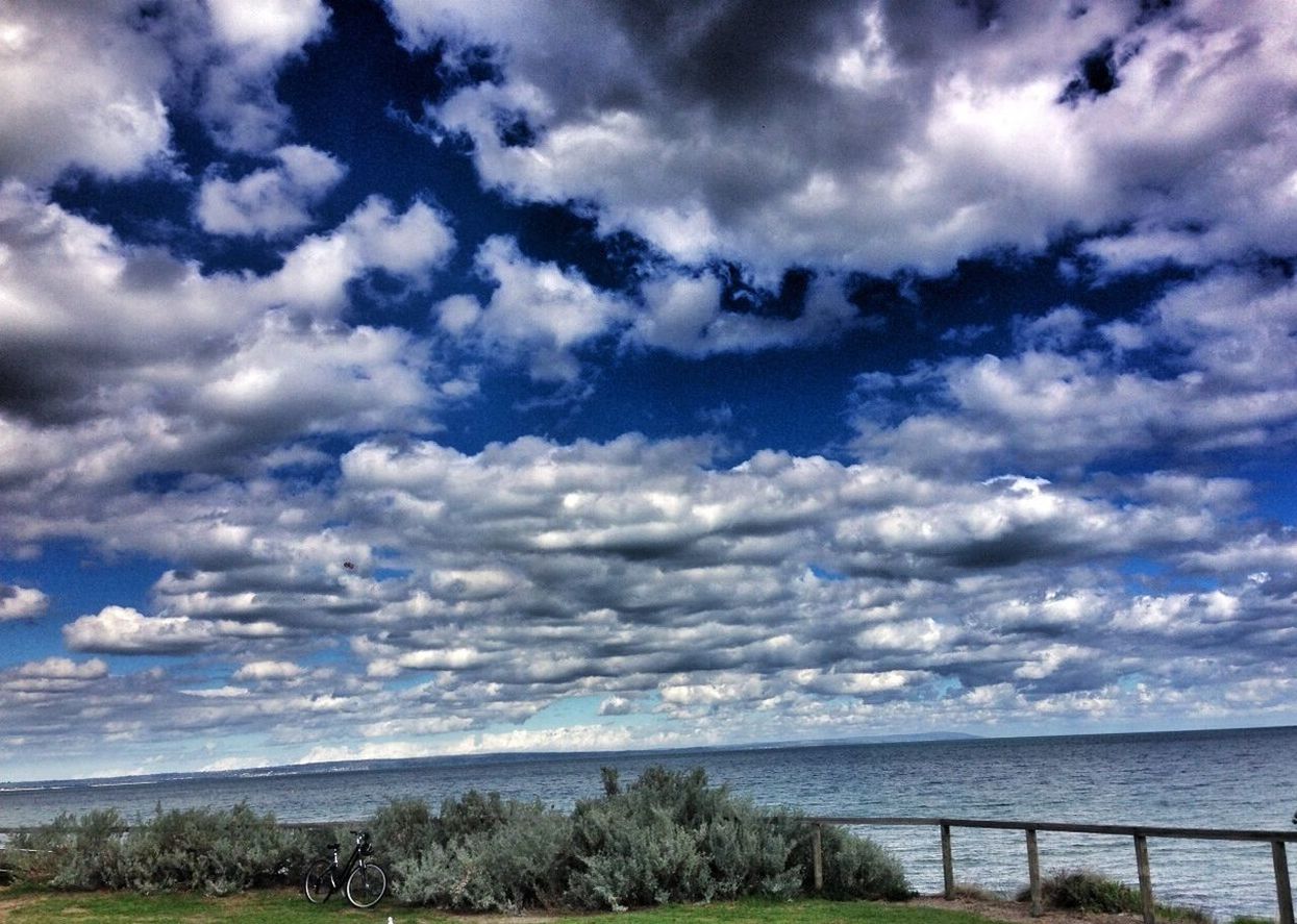 sky, sea, horizon over water, water, cloud - sky, tranquil scene, tranquility, scenics, cloudy, beauty in nature, cloud, nature, beach, idyllic, shore, weather, landscape, non-urban scene, coastline, day