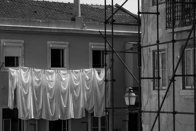 Clothes drying outside house