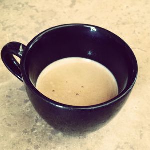 Close-up overhead view of coffee cup