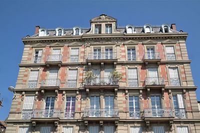 Low angle view of building against clear sky