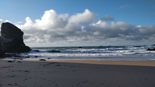 Scenic view of beach against sky