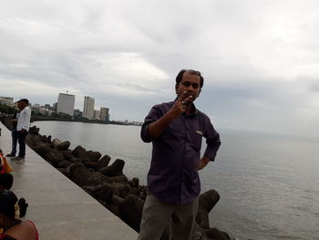 Full length of man against sea against sky