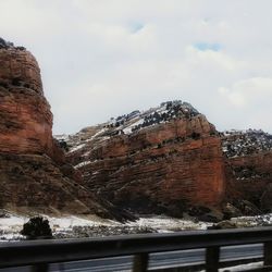 Scenic view of mountains against sky during winter