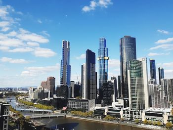 Modern buildings in city against sky