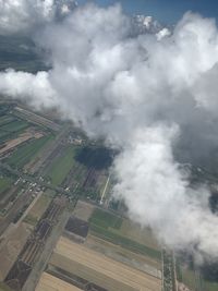 Aerial view of agricultural field against sky