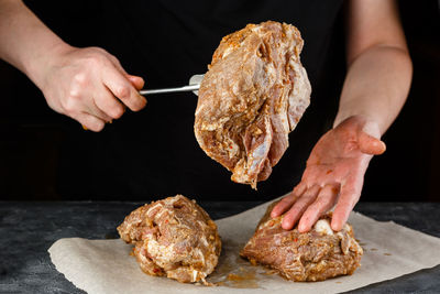 Close-up of person preparing food