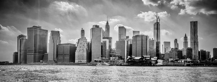 Panoramic view of modern buildings against sky