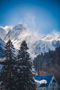 Scenic view of snowcapped mountains against sky