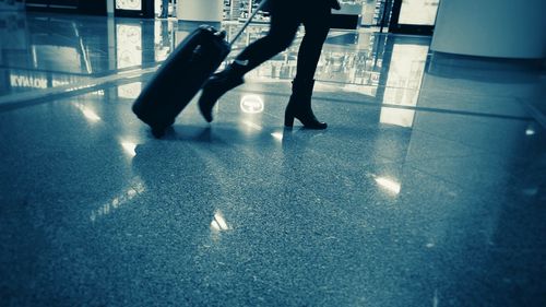 Close-up of woman standing on floor
